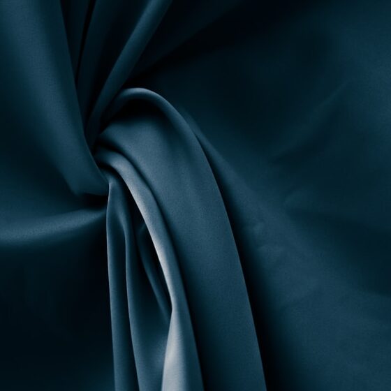 blue textile in close up photography